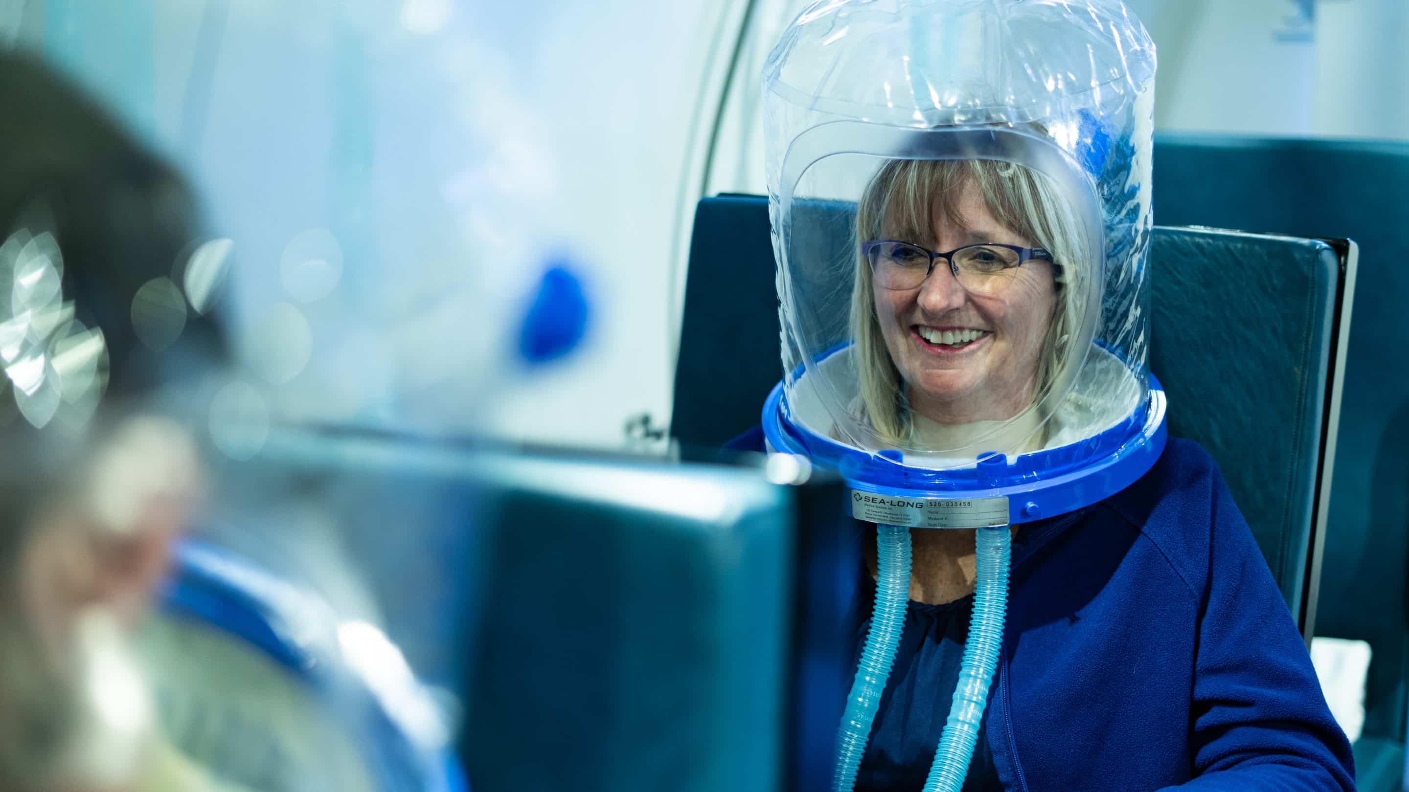 Woman in chamber for a dive